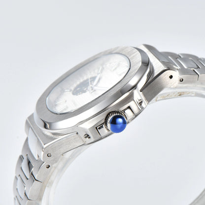 Side view of open heart Nautilus style Seiko mod watch, polished stainless steel case and silver crown detail