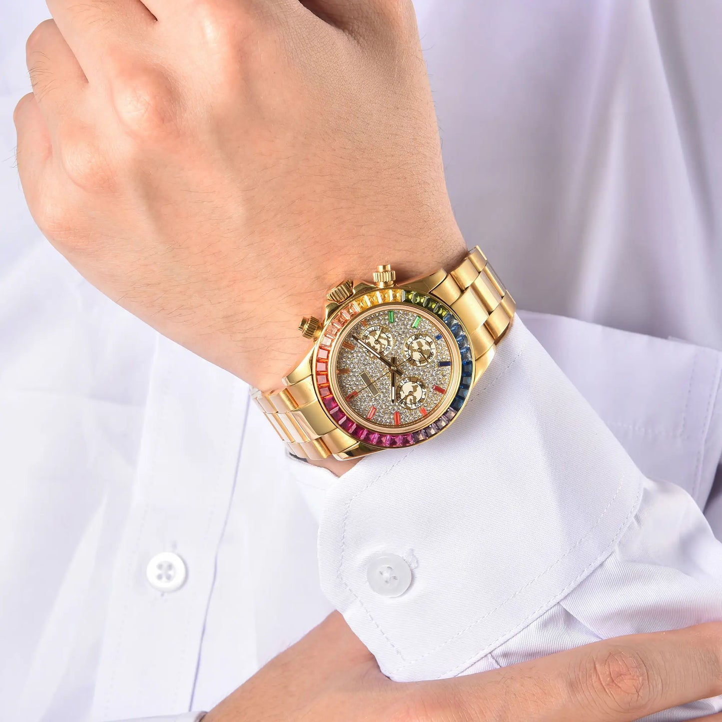 Men's rainbow gem bezel Daytona style Seiko mod chronograph watch on wrist, business lifestyle shot