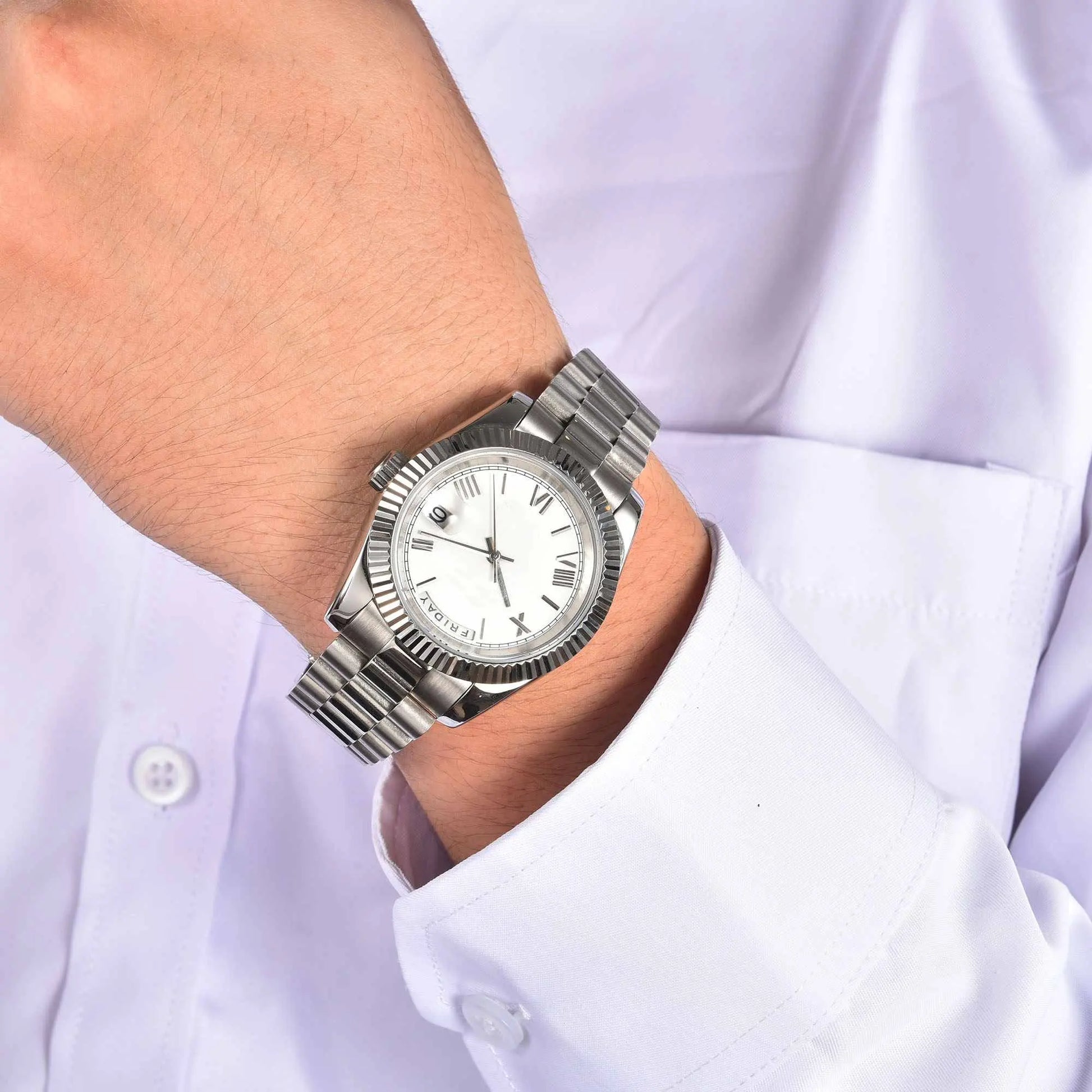 Silver white Seiko mod watch worn on wrist, daily lifestyle shot