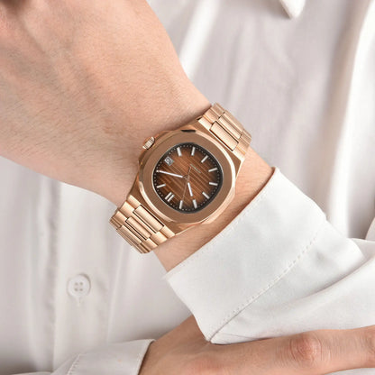 Rose gold brown Nautilus style Seiko mod watch with stainless steel bracelet on wrist, business lifestyle shot
