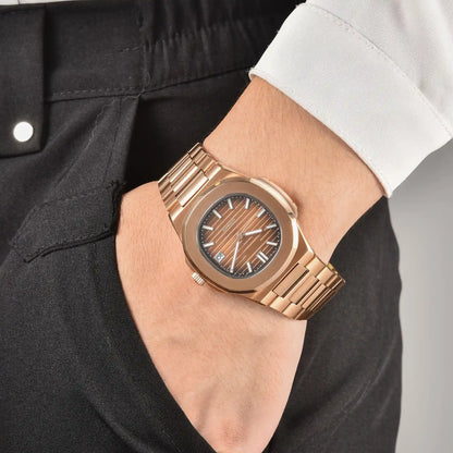 Men's rose gold brown Nautilus style Seiko mod watch on wrist, casual daily wear lifestyle shot