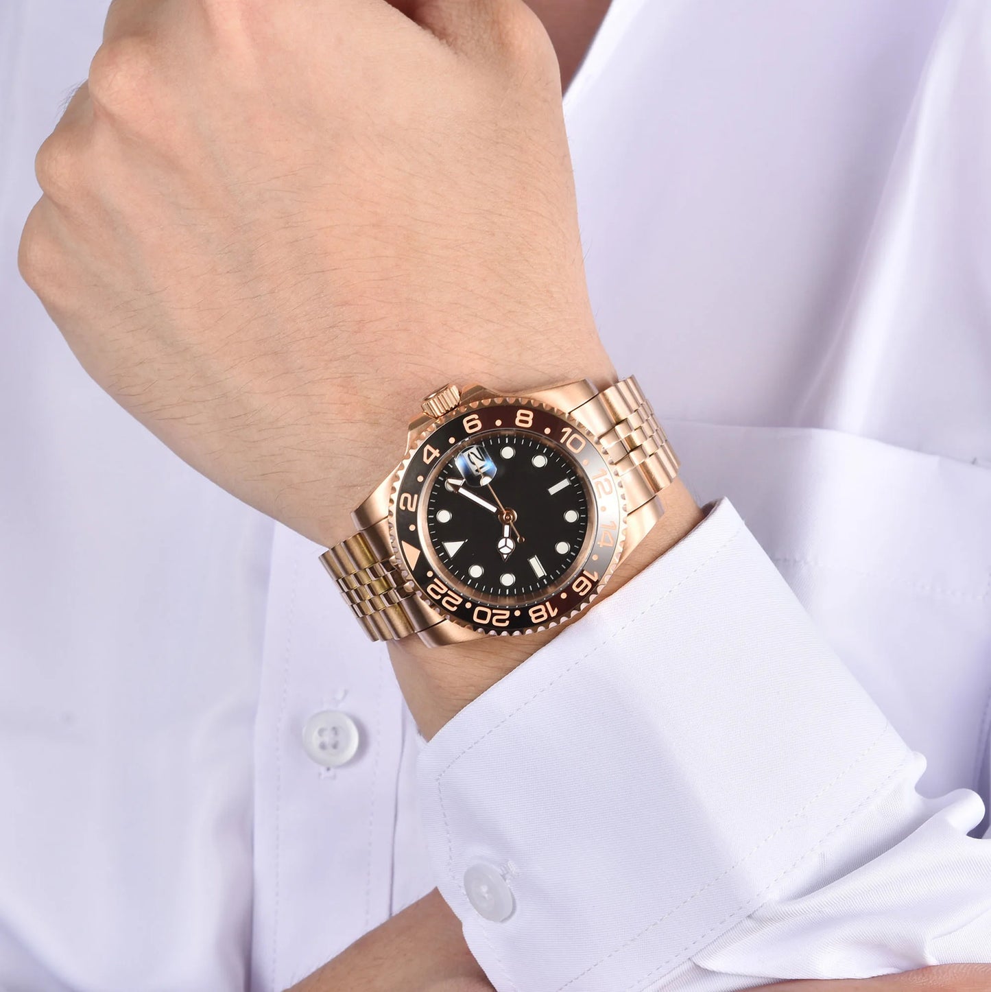 Wrist shot of custom Seiko nh35 GMT mod watch with sapphire crystal and lumen black dial