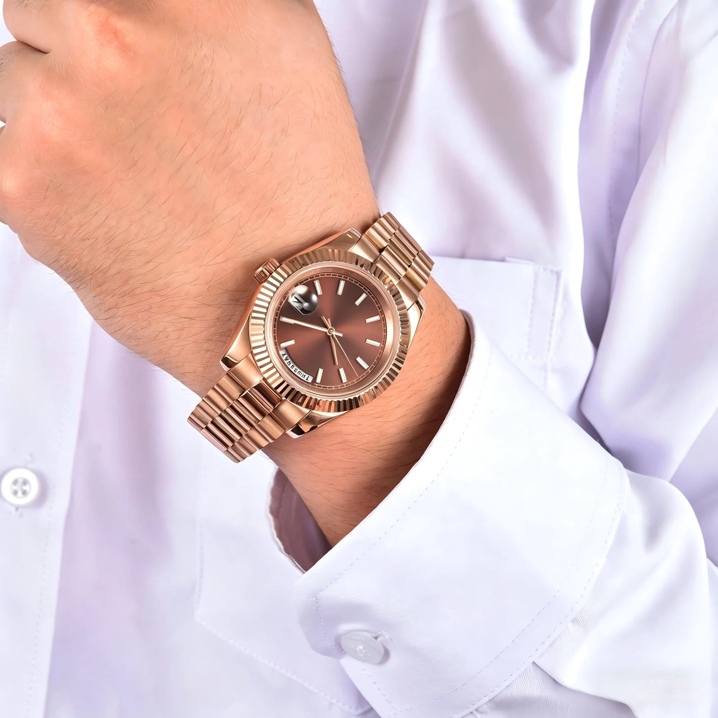 Rose gold custom Seiko mod watch worn on wrist, casual daily wear