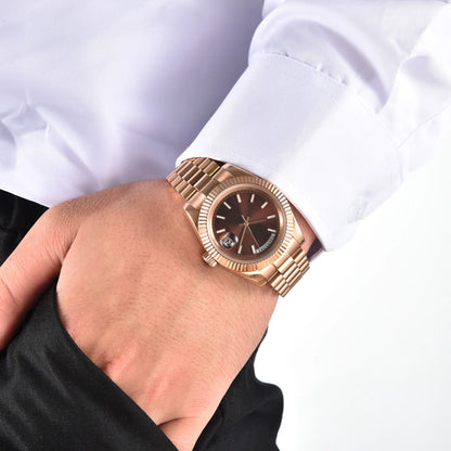 Men's rose gold Seiko mod watch on wrist, daily business lifestyle shot