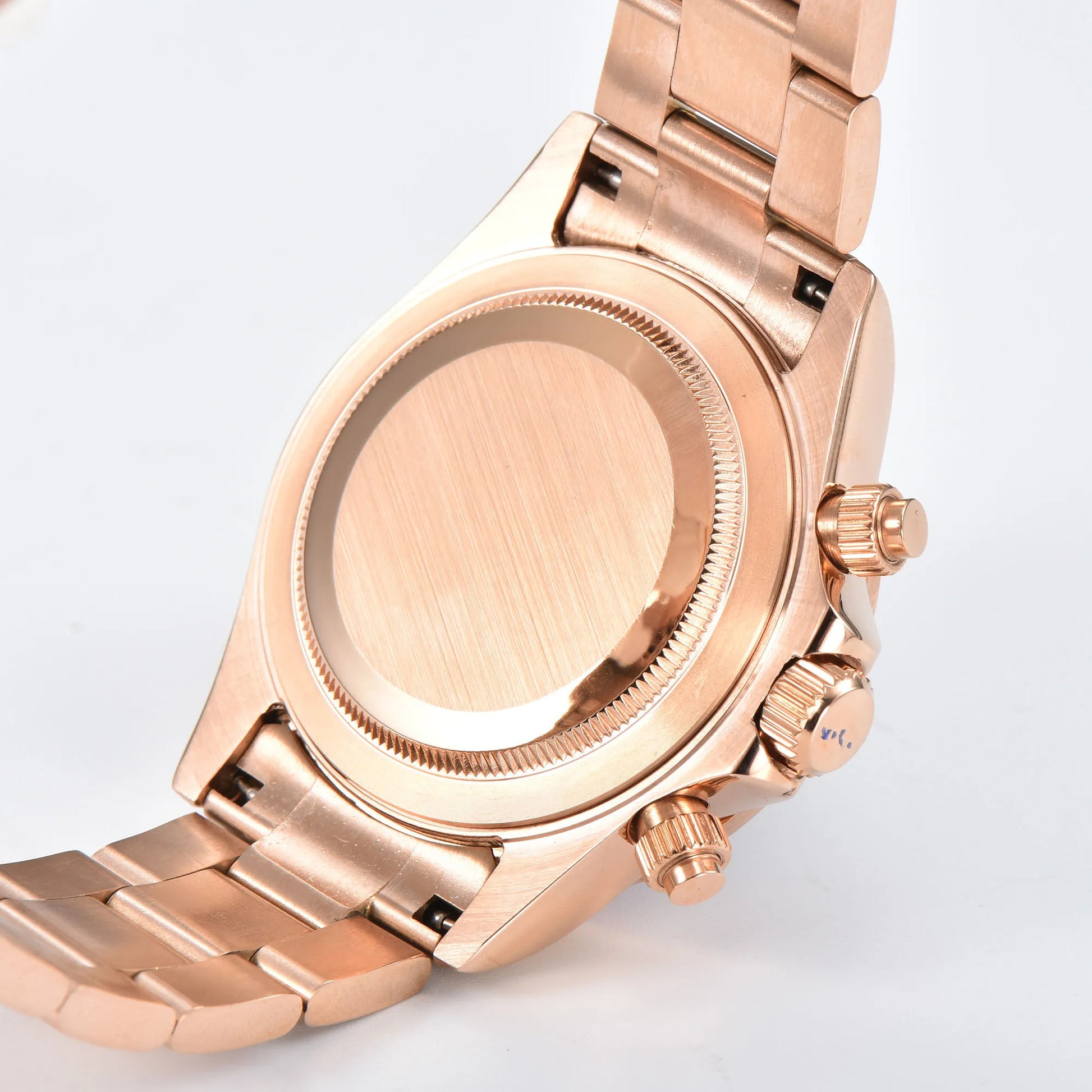 Side view of rose gold VK63 Daytona style Seiko mod watch, stainless steel chronograph pushers detail