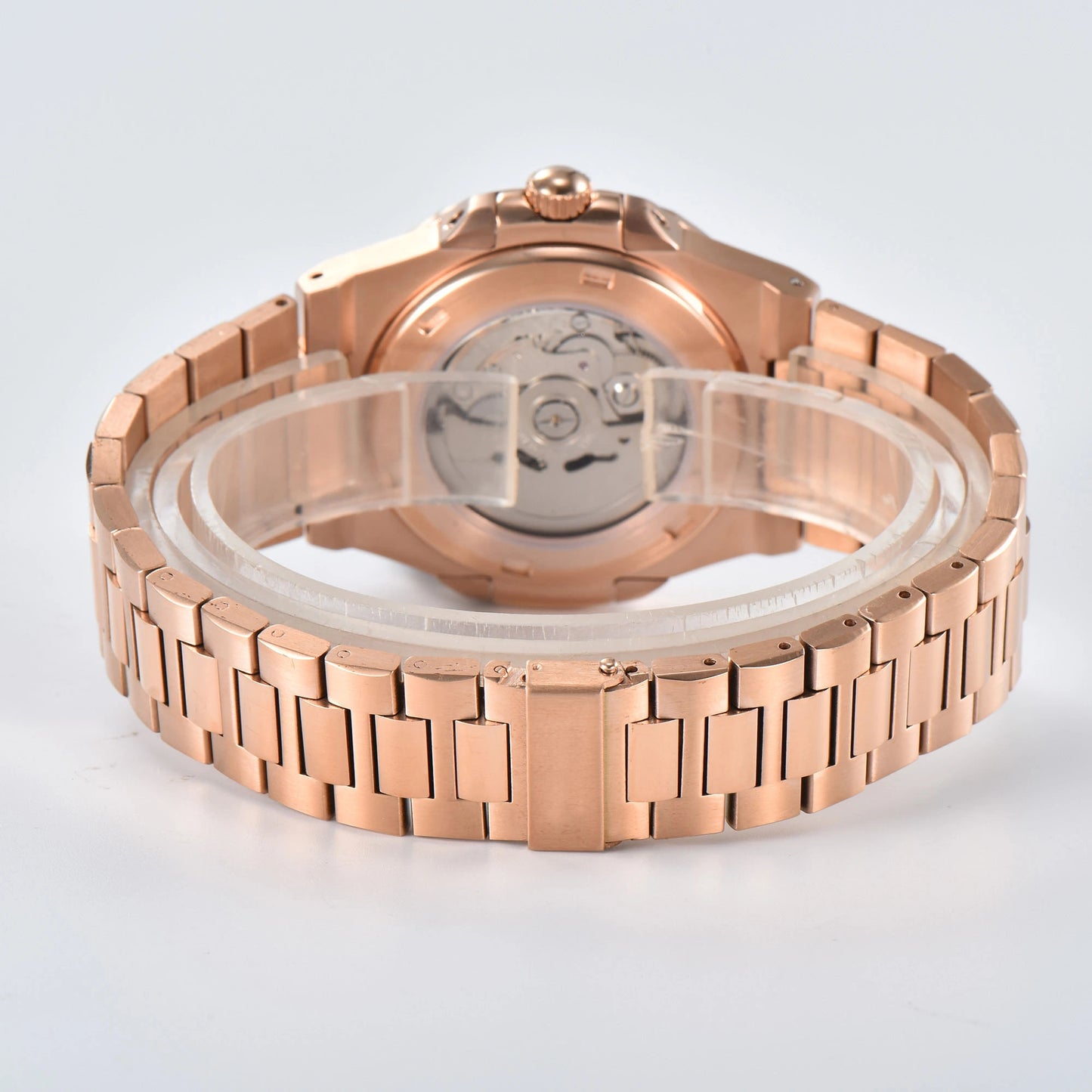 Transparent case back and deployment clasp of rose gold Nautilus style Seiko mod watch with stainless steel bracelet