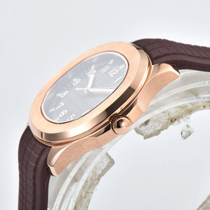 Side view of rose gold Aquanaut style Seiko mod watch, polished rose gold case and crown detail