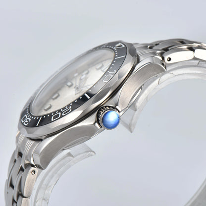 Side view of Seamaster style Seiko mod watch, blue crown and black ceramic bezel detail