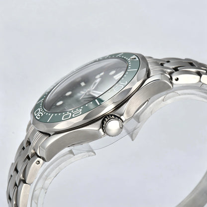 Side view of Seamaster style Seiko mod watch, silver crown and green ceramic bezel detail