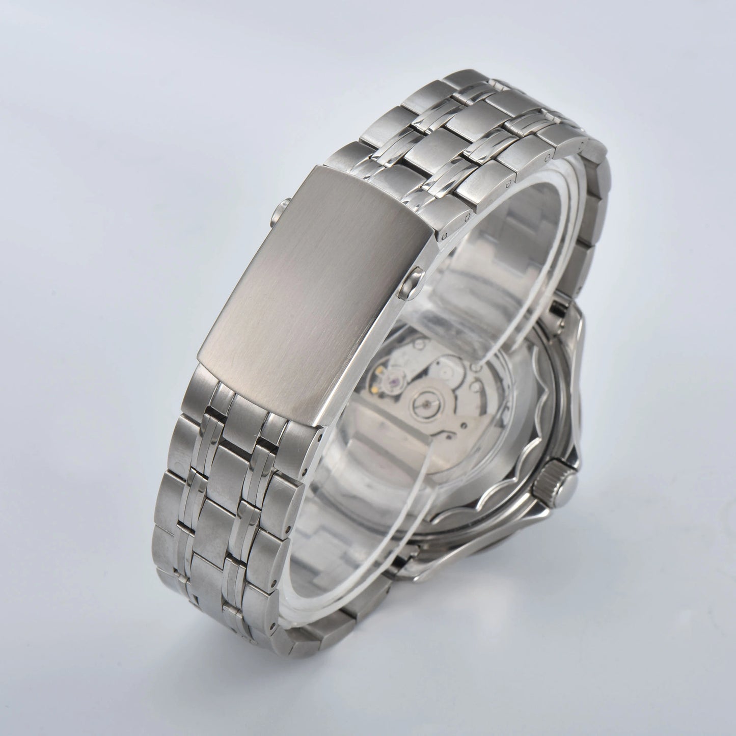 Close-up of custom seamaster Seiko mod watch solid stainless steel bracelet with security clasp and micro-adjustment