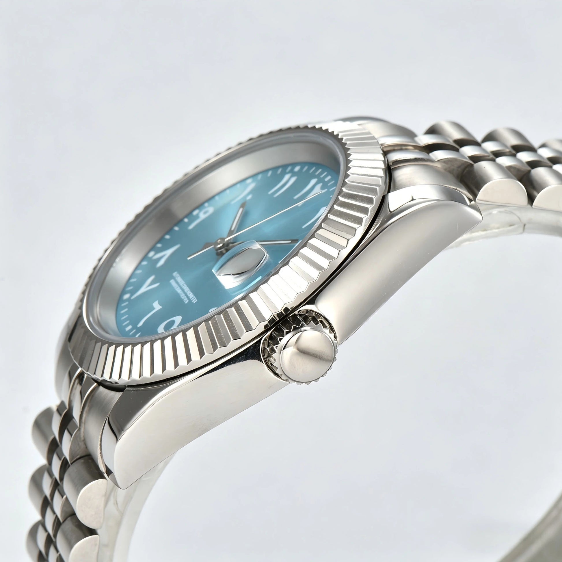 Side view of Seiko modified datejust watch showing signed screw-down crown and sapphire crystal
