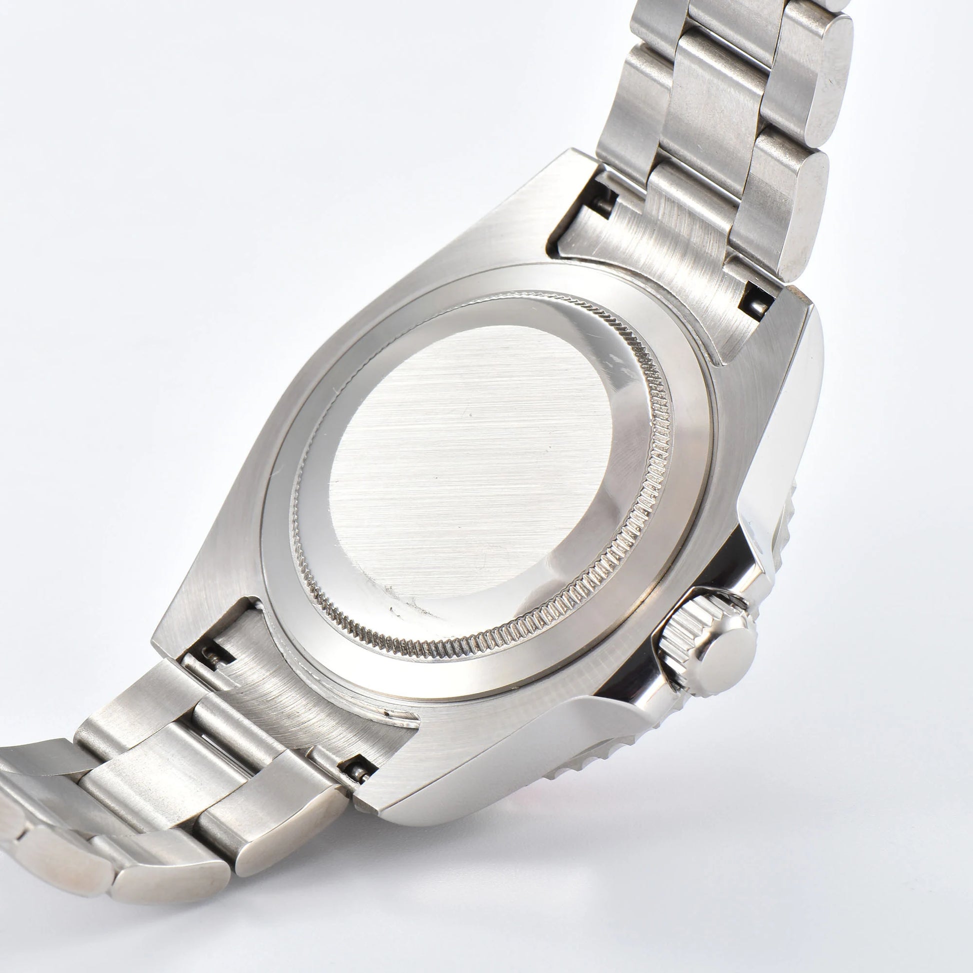 Custom Seiko mod watch with close case back showing silver 316L stainless steel case