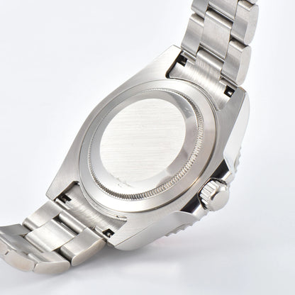 Custom Seiko mod watch with close case back showing silver 316L stainless steel case