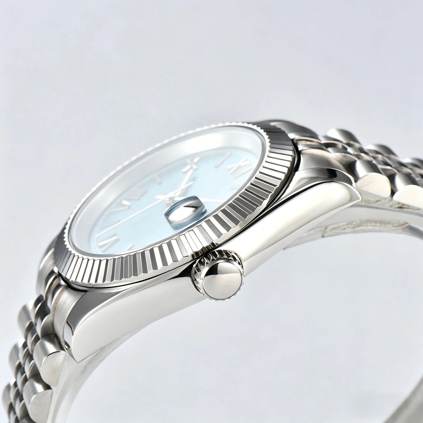 Side view of Seiko modified datejust watch showing signed screw-down crown and sapphire crystal