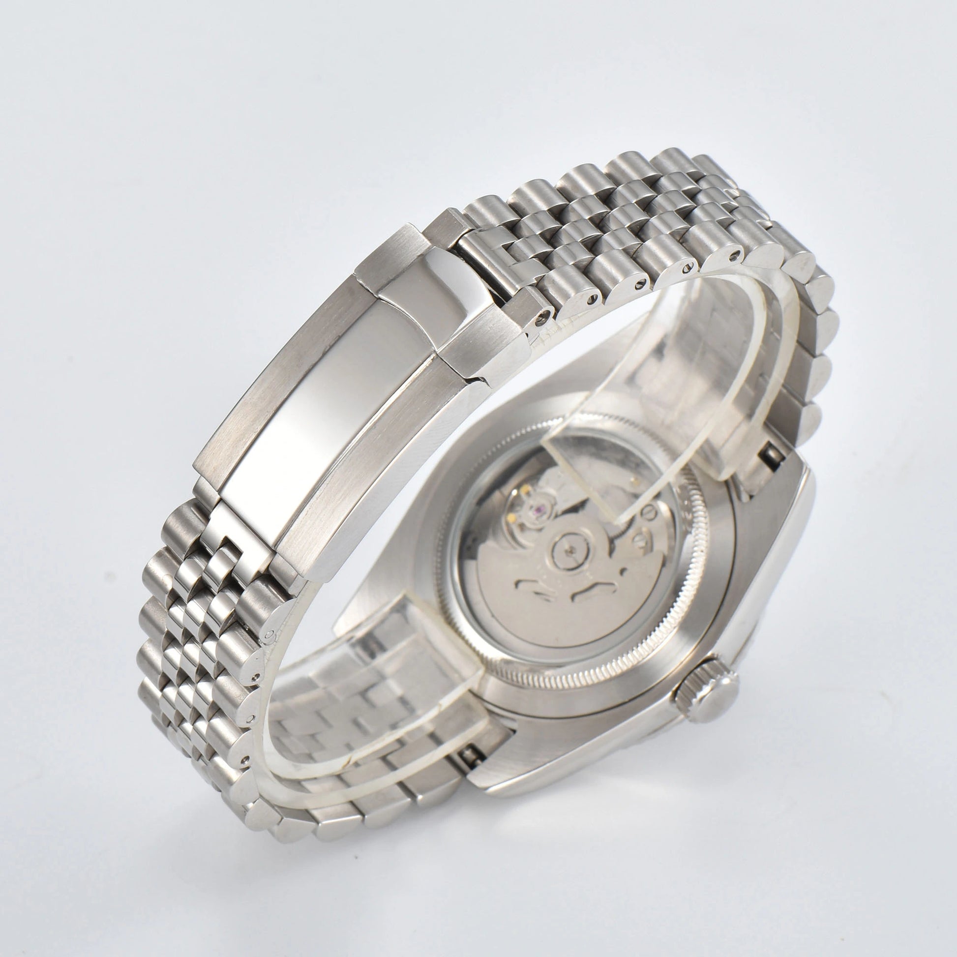 Close-up of custom Seiko mod watch solid stainless steel bracelet with safety folding clasp and micro-adjustment