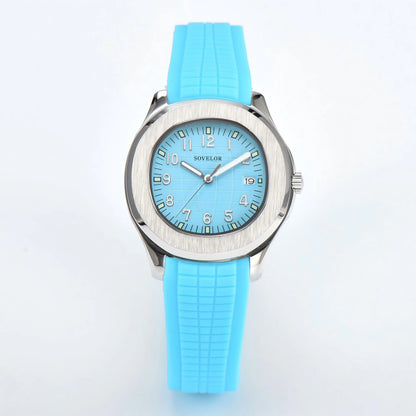Custom Aquanaut style Seiko mod watch, silver case with powder blue dial and rubber strap, NH35 automatic movement