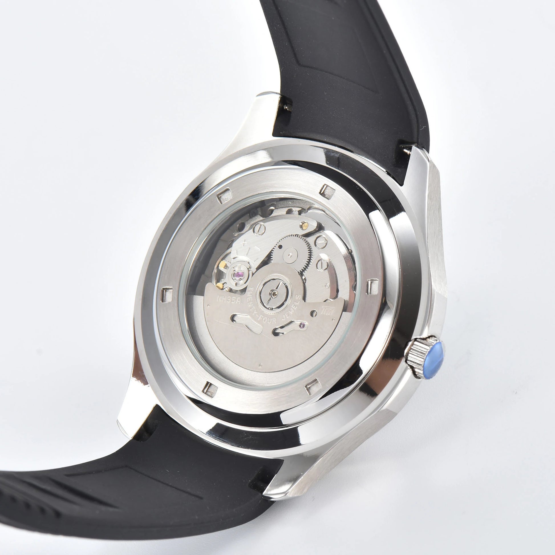 Clear case back showing Seiko NH35 automatic movement in silver Aquanaut style Seiko mod watch