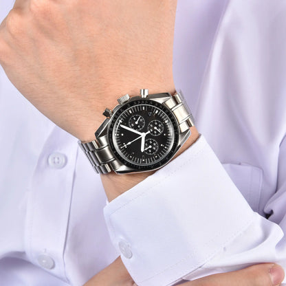 Silver chronograph speedmaster style Seiko mod watch on wrist, business lifestyle