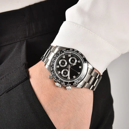 Men's classic black VK63 Daytona style Seiko mod chronograph watch on wrist, business lifestyle shot
