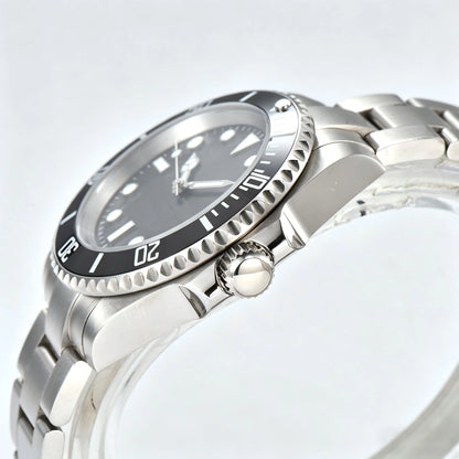 Side view of silver black Seiko mod watch, Submariner style with polished stainless steel case