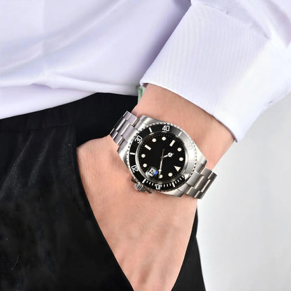 Wrist shot of custom Seiko mod watch worn with a formal suit, showcasing the polished finish and refined dial details