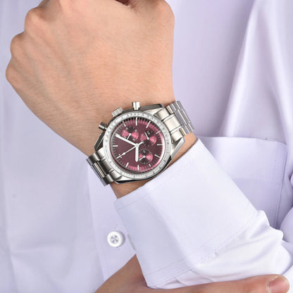 Silver burgundy chronograph speedmaster style Seiko mod watch on wrist, business lifestyle shot