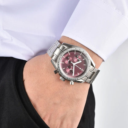 Men's silver burgundy chronograph speedmaster Seiko mod watch on wrist, casual daily wear shot