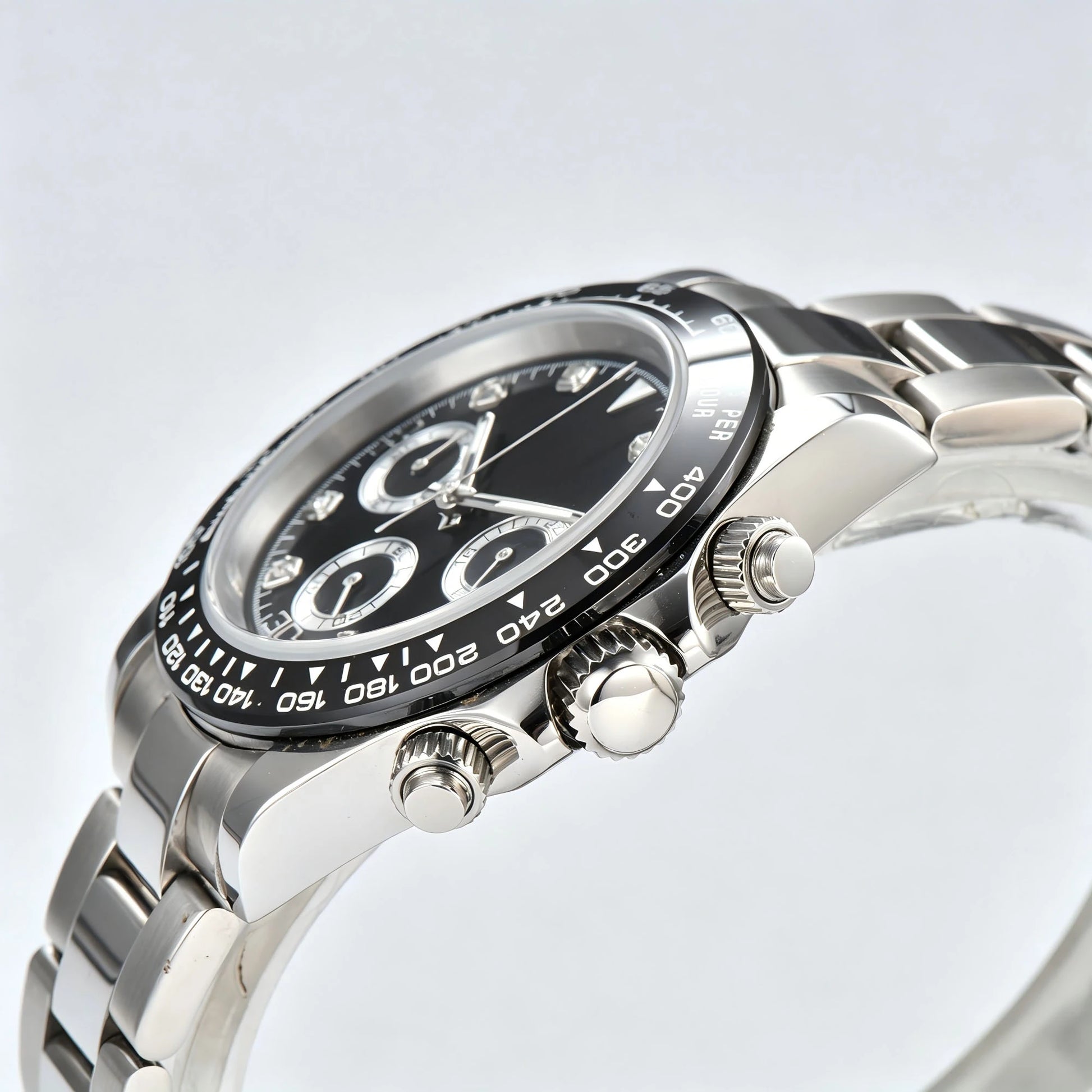 Side angle view of classic black VK63  Daytona style Seiko mod watch, colorful gemstone tachymeter bezel detail