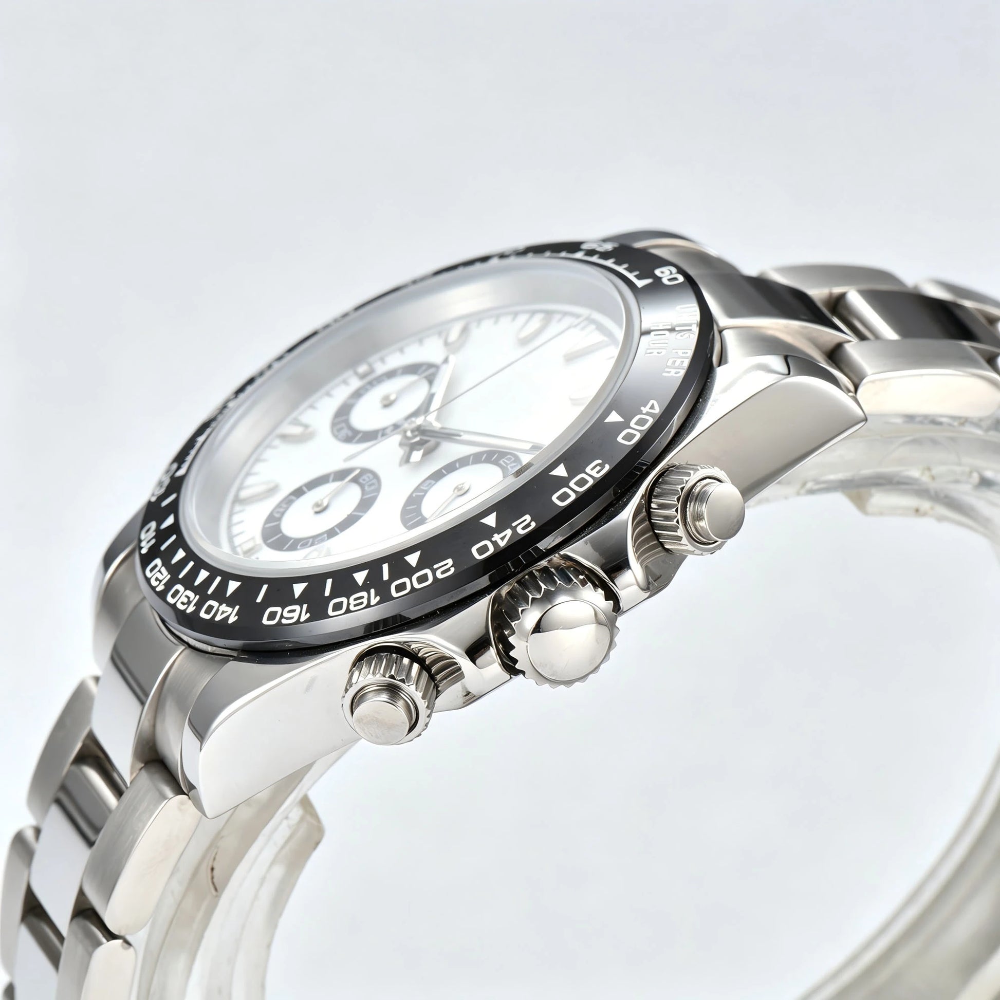 Side angle view of panda VK63 Daytona style Seiko mod watch, black tachymeter bezel detail