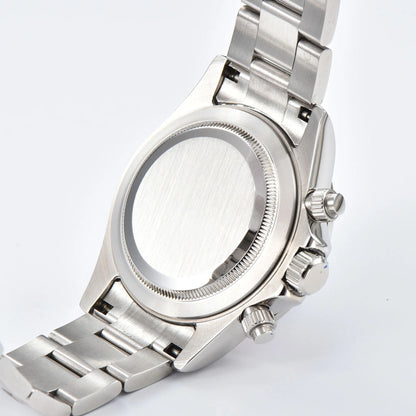 Side view of panda VK63 Daytona style Seiko mod watch, silver stainless steel chronograph pushers detail