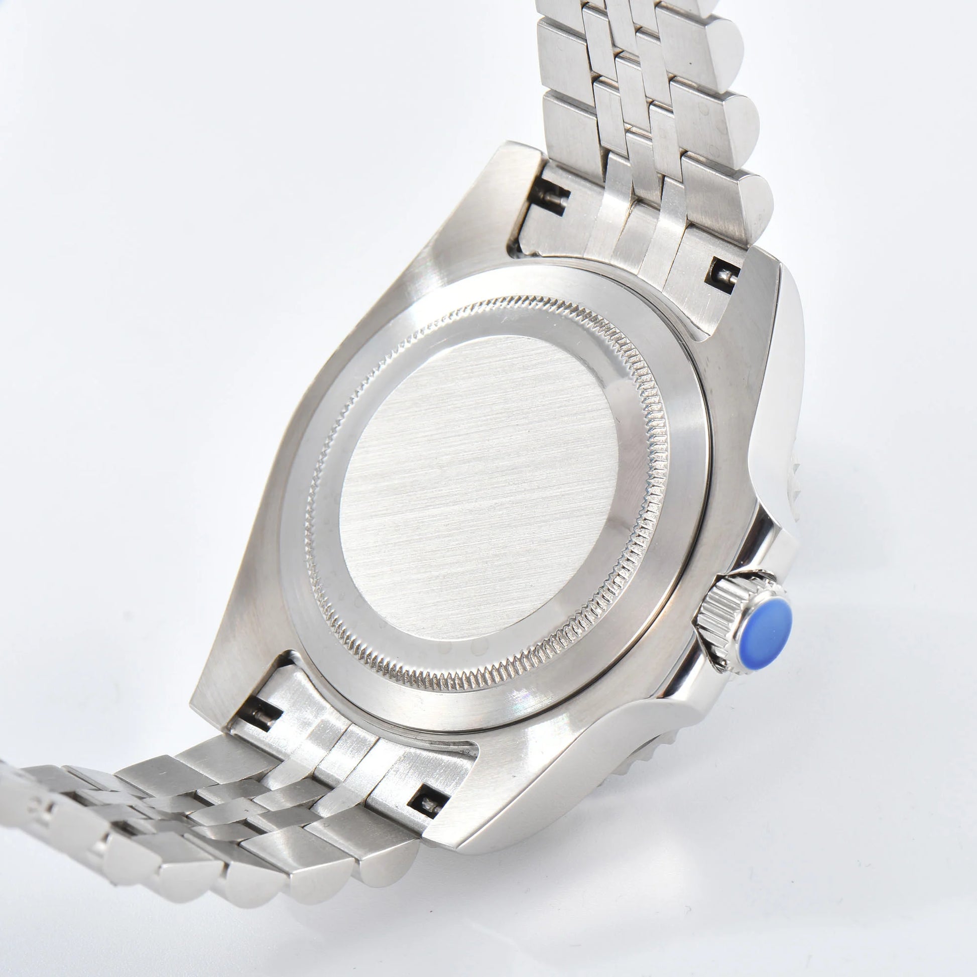 Custom Seiko mod gmt watch with close caseback showing silver 316L stainless steel case