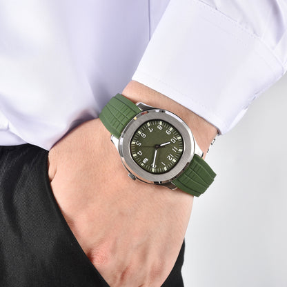 Men's silver green Aquanaut style Seiko mod watch on wrist, casual daily wear lifestyle shot