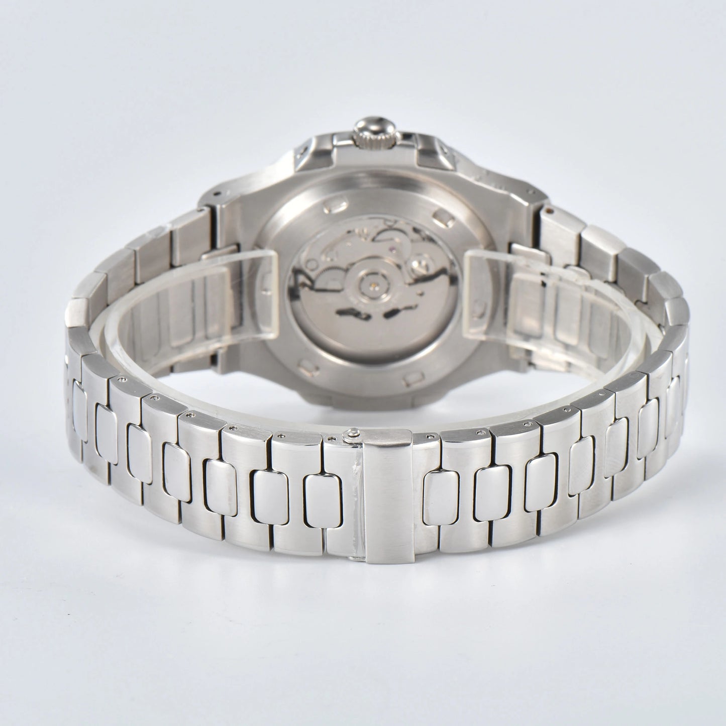 Transparent case back and deployment clasp of silver Nautilus style Seiko mod watch with stainless steel bracelet