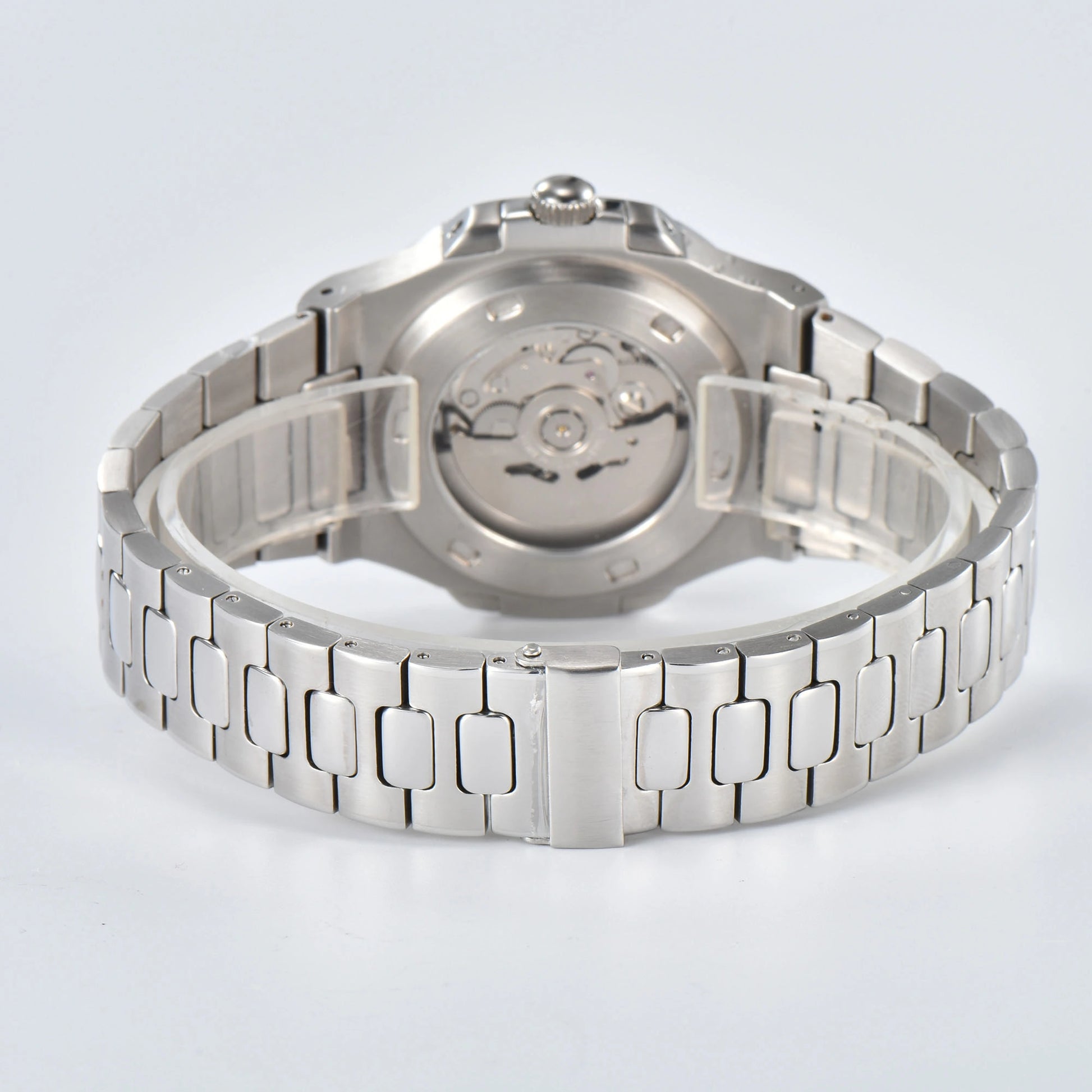Transparent case back and deployment clasp of silver Nautilus style Seiko mod watch with stainless steel bracelet