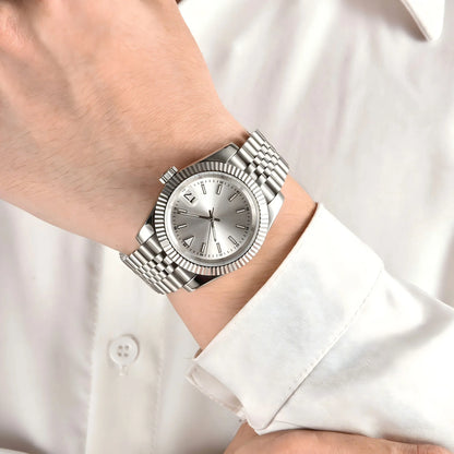 Wrist shot of custom Seiko nh35 datejust mod watch with sapphire crystal and sunburst silver dial