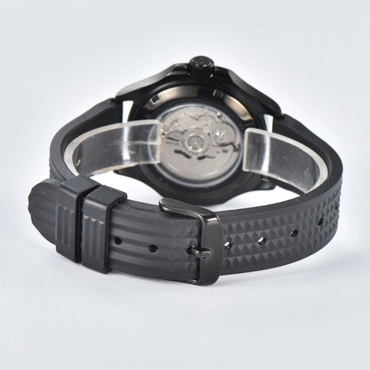 Transparent case back and pin buckle of skeleton Aquanaut style Seiko mod watch with black rubber strap