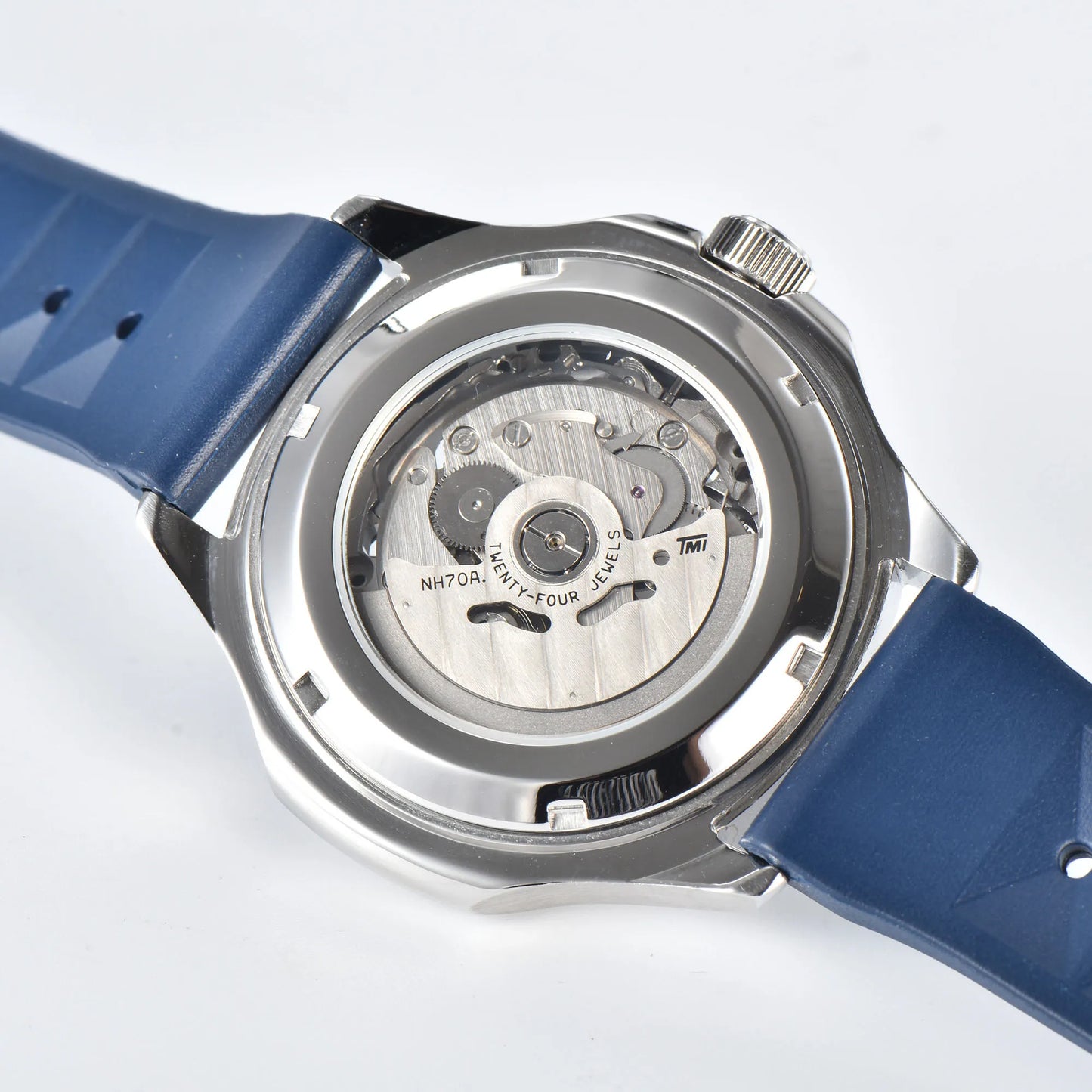 Clear case back showing Seiko NH70 automatic movement in skeleton Aquanaut style Seiko mod watch