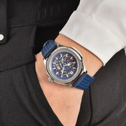 Men's skeleton Aquanaut style Seiko mod watch on wrist, casual daily wear lifestyle shot