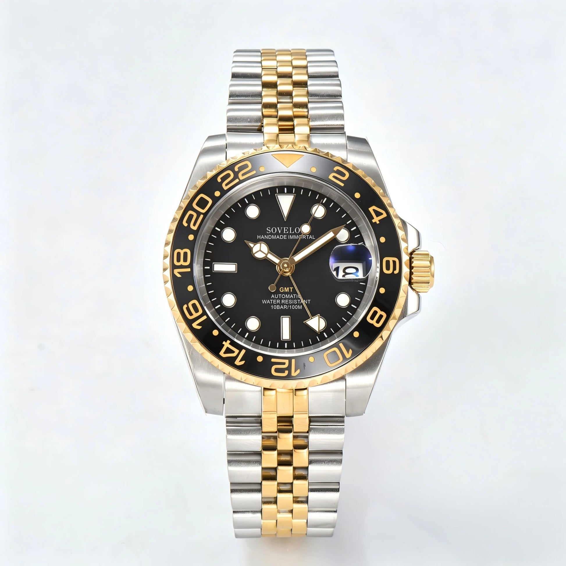 GMT Seiko mod custom watch with gold black bezel and Seiko NH34 automatic movement, sapphire crystal case