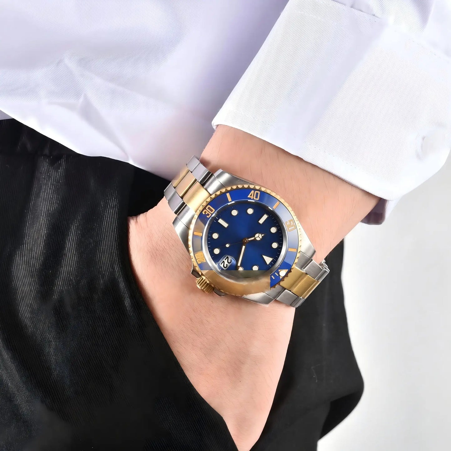 Two-tone gold blue custom Seiko mod watch worn on wrist, casual daily wear lifestyle shot