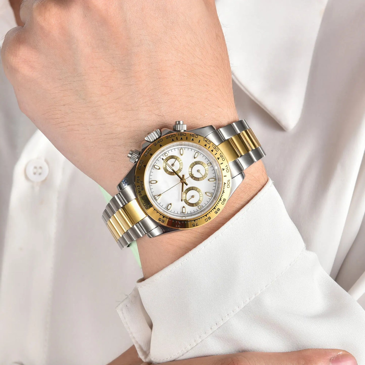 Men's Two-Tone white VK63 Daytona style Seiko mod chronograph watch on wrist, business lifestyle shot