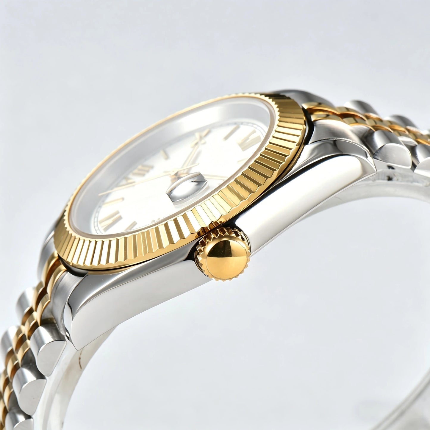 Side view of Seiko modified datejust watch showing signed screw-down crown and sapphire crystal Two-Tone case