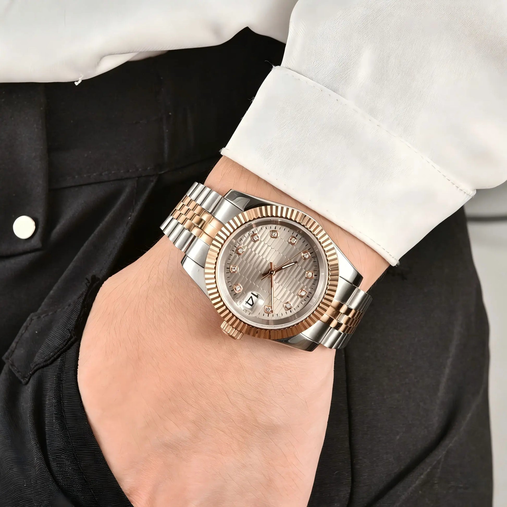 Wrist shot of custom Seiko mod watch worn with a formal suit, showcasing the polished finish and refined dial details