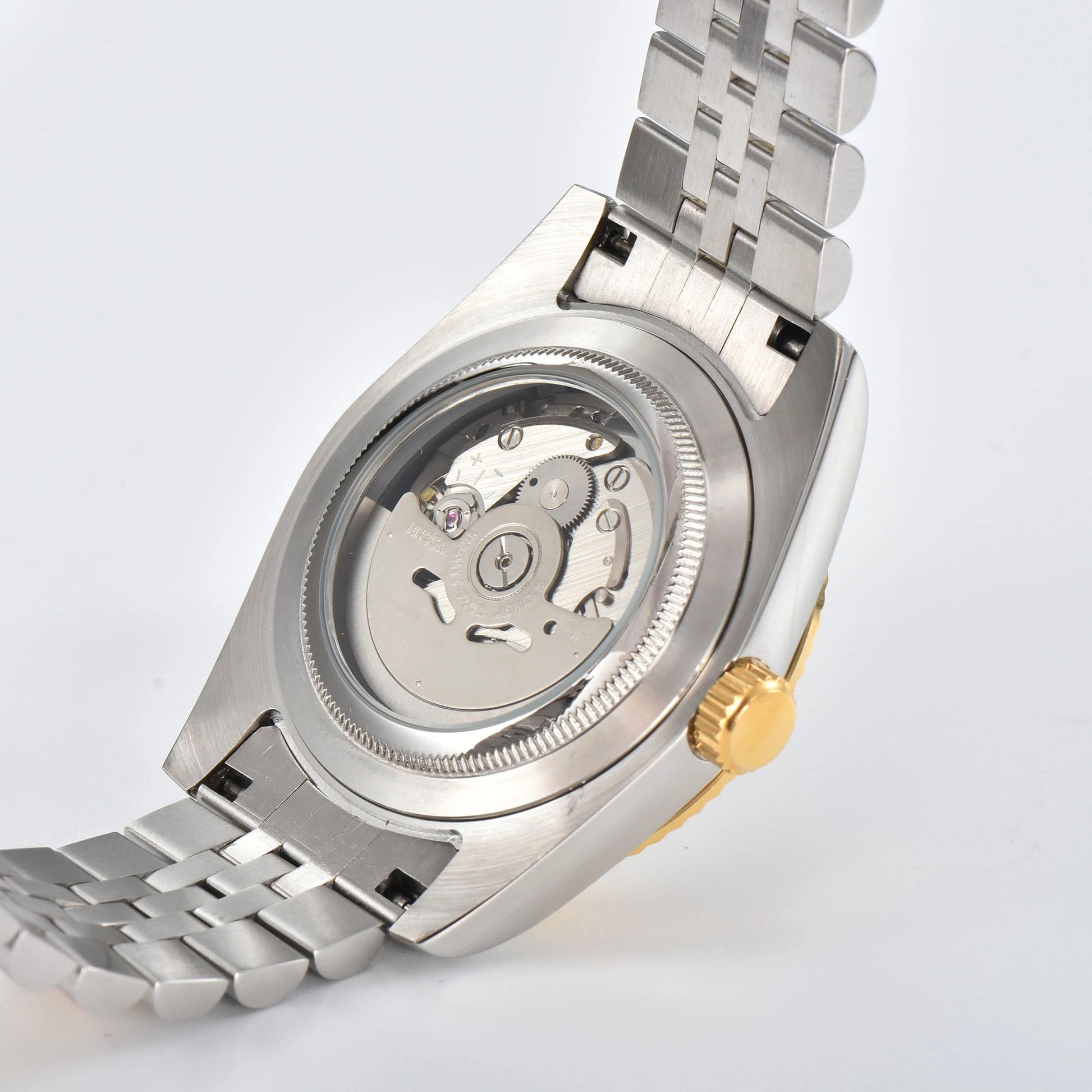 Custom Seiko mod watch with exhibition caseback showing Seiko NH35 automatic movement with custom rotor