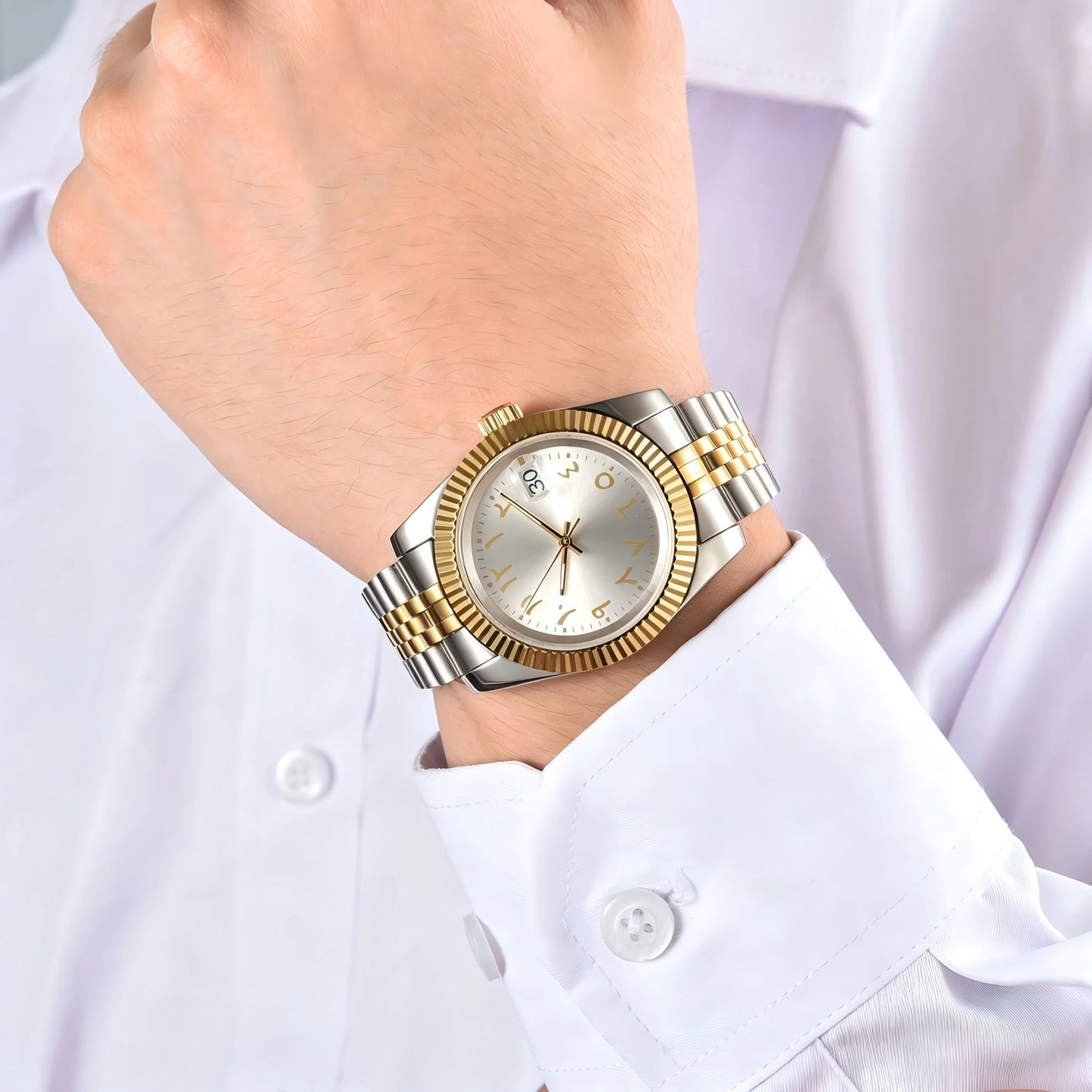 Wrist shot of custom gold silver Two-Tone Seiko nh35 datejust mod watch with sapphire crystal and Arabic number dial