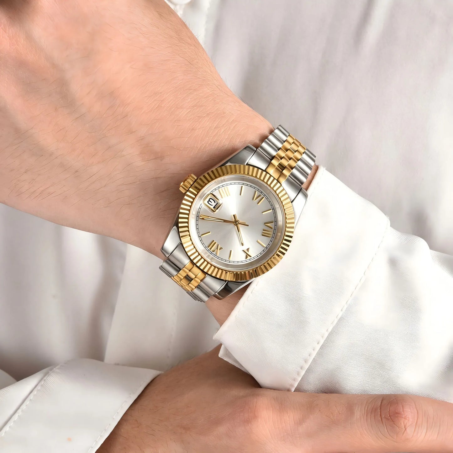 Wrist shot of custom Seiko mod watch worn with a formal suit, showcasing the polished finish and refined dial details